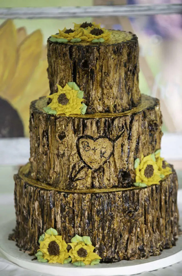 3 Tier rustic buttercream tree stump cake decorated with buttercream sunflowers