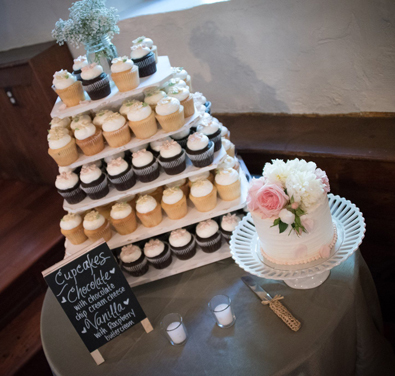 Small wedding cutting cake and and cupcakes. Stonemill Inn, Hallam PA