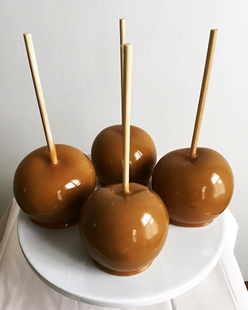 Top view of apples dipped in caramel