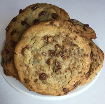 Thick soft center New York style chocolate chip and toffee bits cookies, sprinkled with sea salt