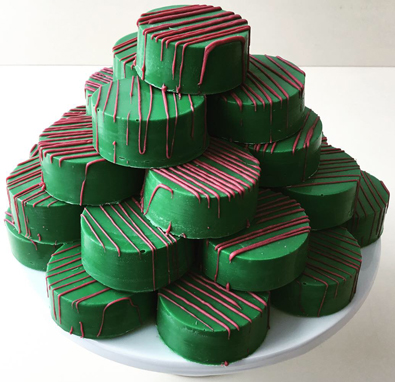 Chocolate Oreo cookies, dipped in dark green chocolate with burgundy chocolate stripes