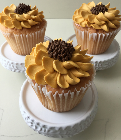 Cupcakes decorated with buttercream sun flowers