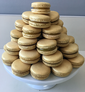 Gold dusted French macaron shells, with lemon filling
