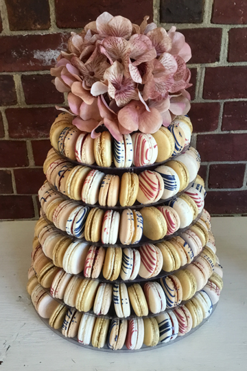 French macarons displayed on a French macaron display tower