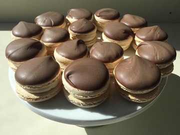 French macarons with Bailey's Irish cream buttercream filling, dipped in chocolate
